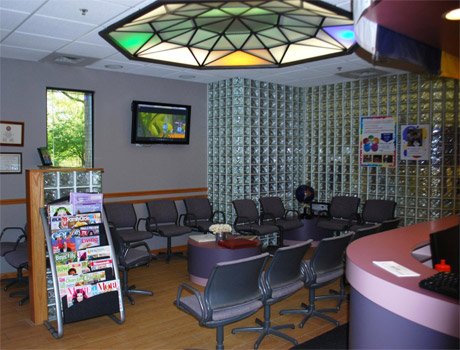 This is our reception area. Here our patients enjoy watching TV, reading magazines, and relaxing from their busy schedules.